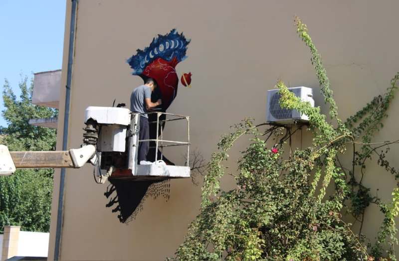 The portrait of Professor Lutfi Zadeh decorated the wall of Mingachevir State University